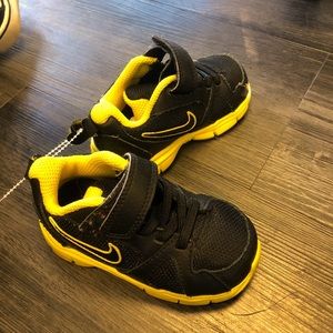 Baby Nikes . Like new . Size 5